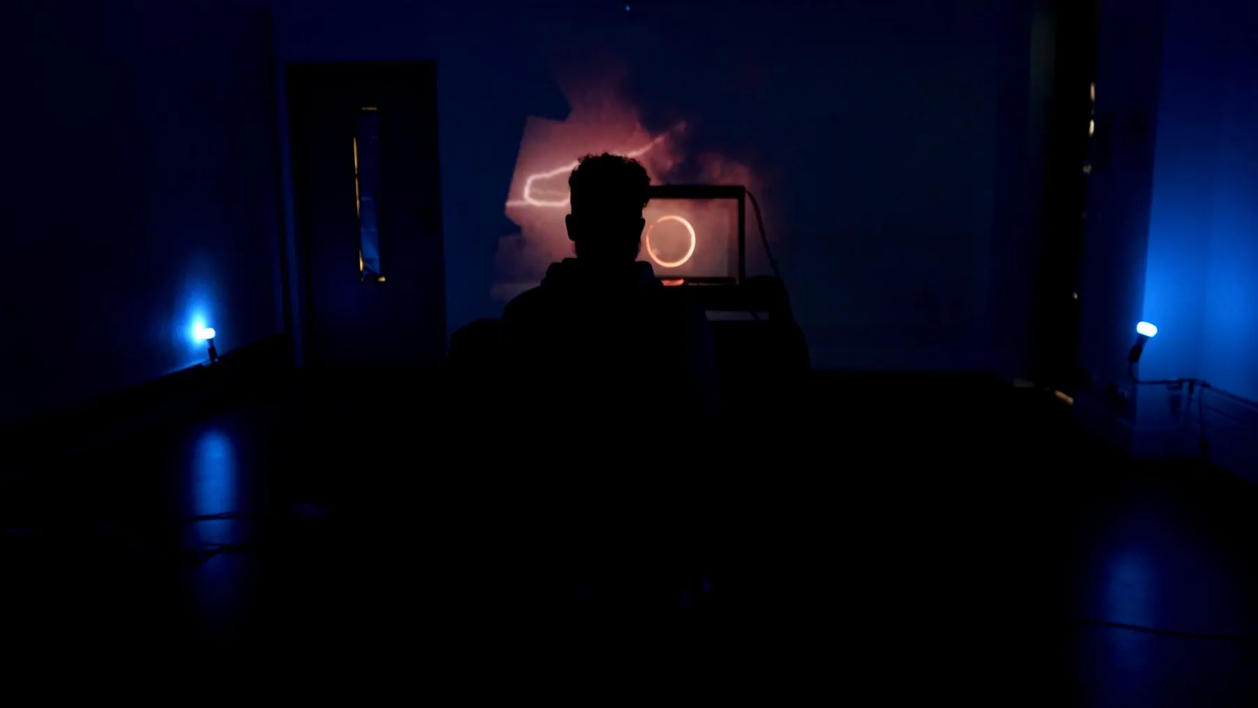 The Passenger installation with immersive purple and blue ambient lighting